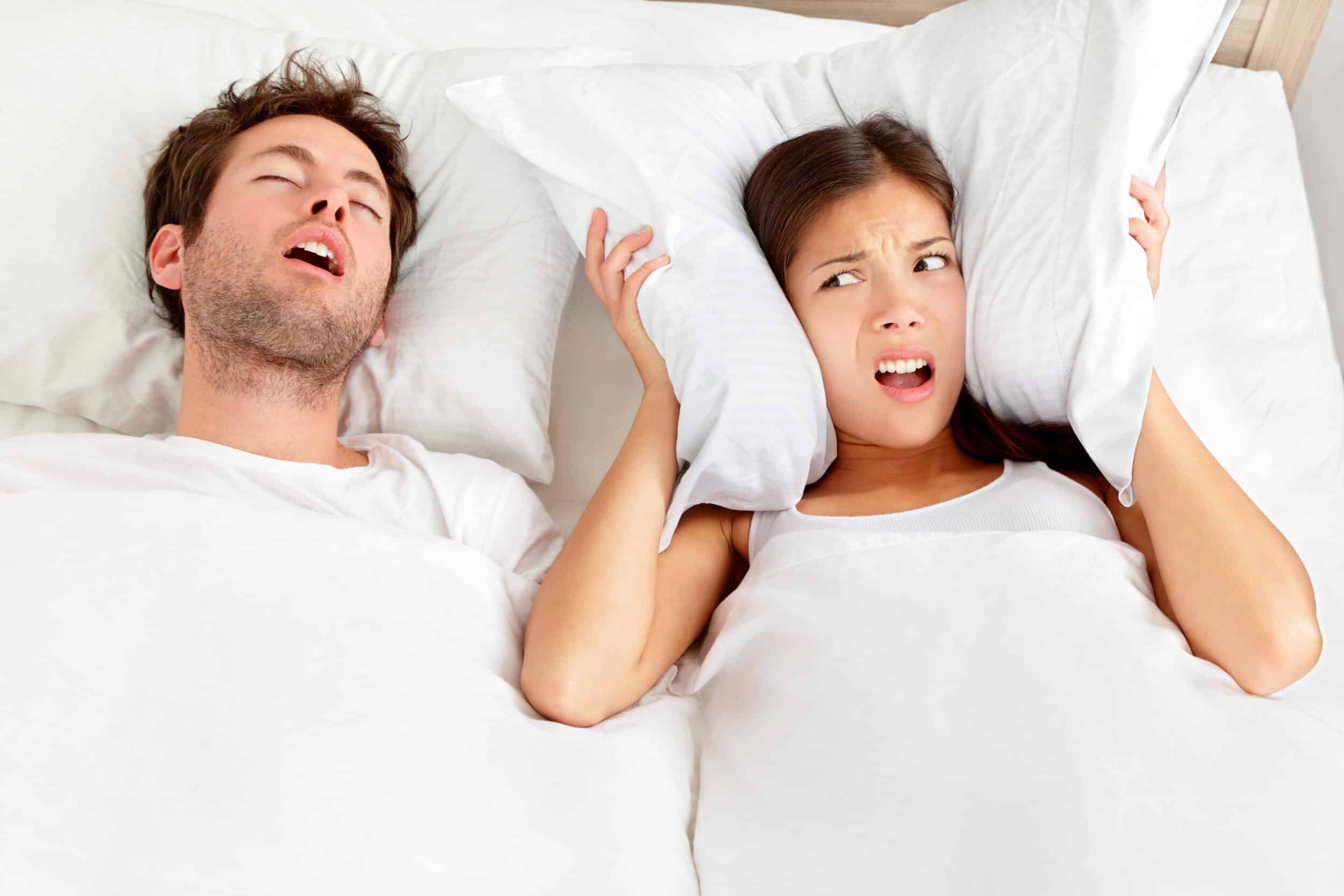 Snoring man wakes up his annoyed wife in Marina Del Rey. This couple needs more restful sleep.